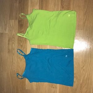 Blue and green tank tops